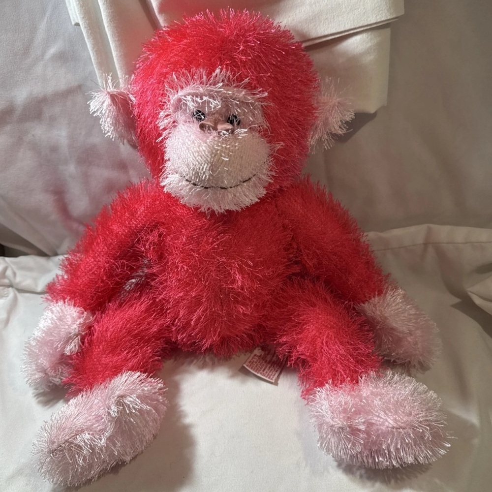 Fluffy Red and Pink Plush Monkey Toy working the monkey shakes